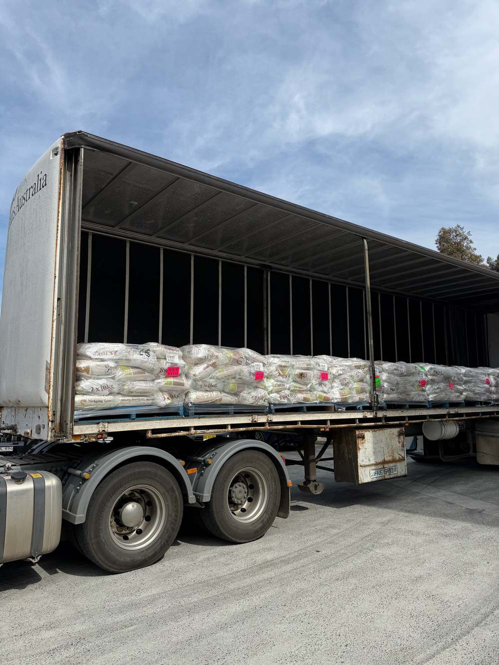 A shipment of Mekong Gems rice loaded for delivery